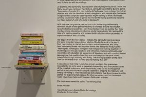 A wall display features a large text panel titled “The Tools Were Never the Point” alongside a small shelf stacked with books. The panel includes a long paragraph of explanatory text and University of Southampton branding at the bottom.